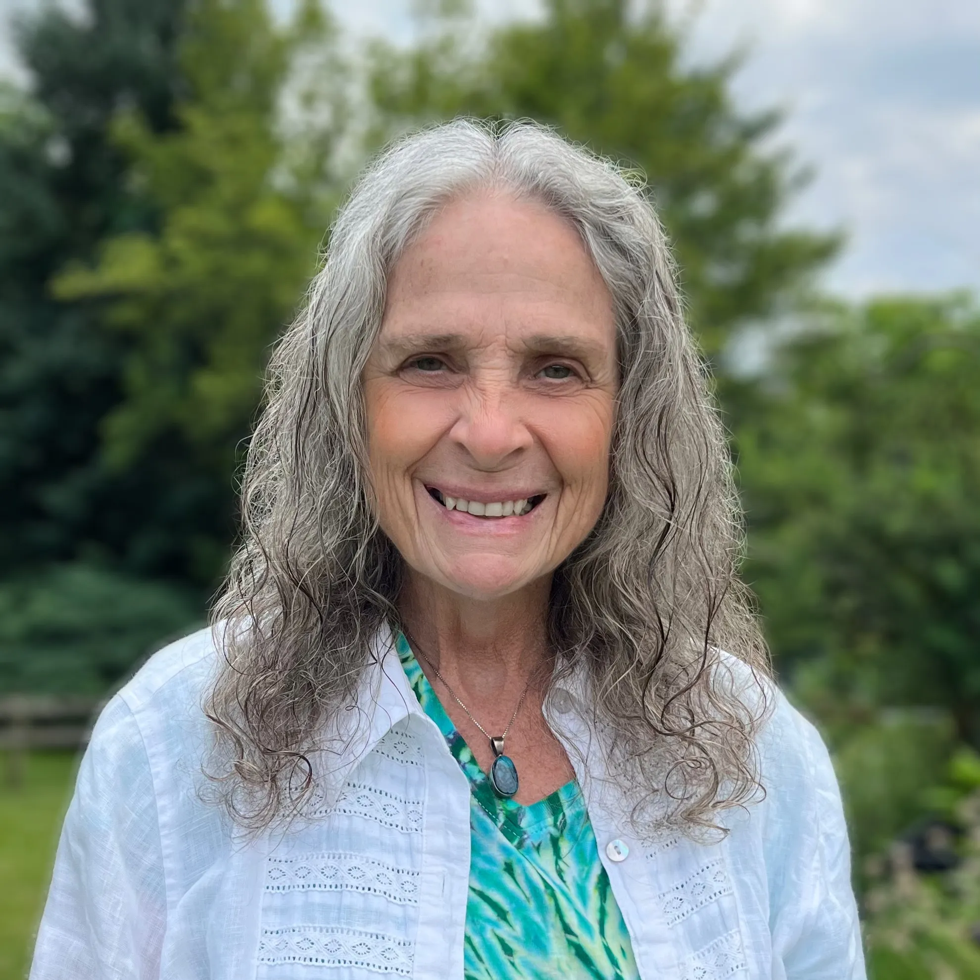 Terri Caldwell, registered dietitian, smiling outdoors in natural light